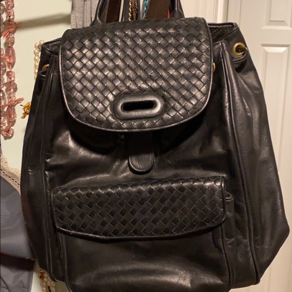 Black leather back pack with woven leather detail